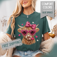 Highland Cow - Pink Heart Shaped Glasses - Comfort Colors | Trendy Women's T-Shirt. Direct to Garment. Printed & Shipped in the USA. Unisex Sizes.