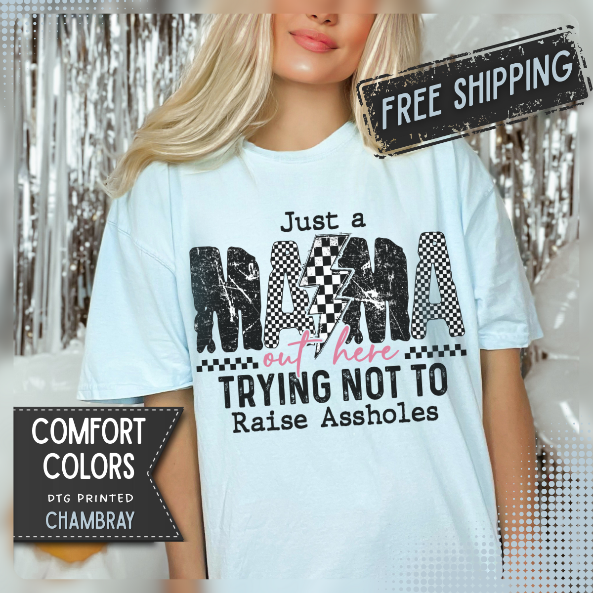 Just a Mama Out Here Trying Not To Raise Assholes - Comfort Colors | Trendy Women's T-Shirt. Direct to Garment. Printed & Shipped in the USA. Unisex Sizes.