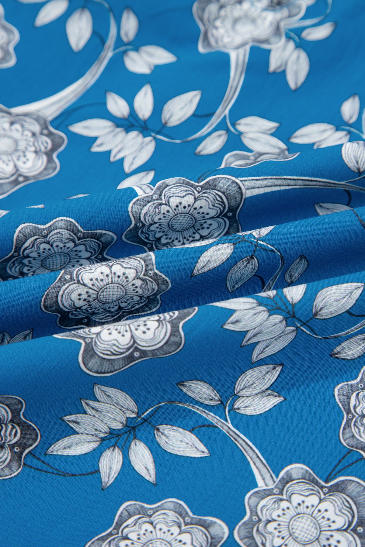 Blue Floral Top with Tie Neck & Puff Sleeves