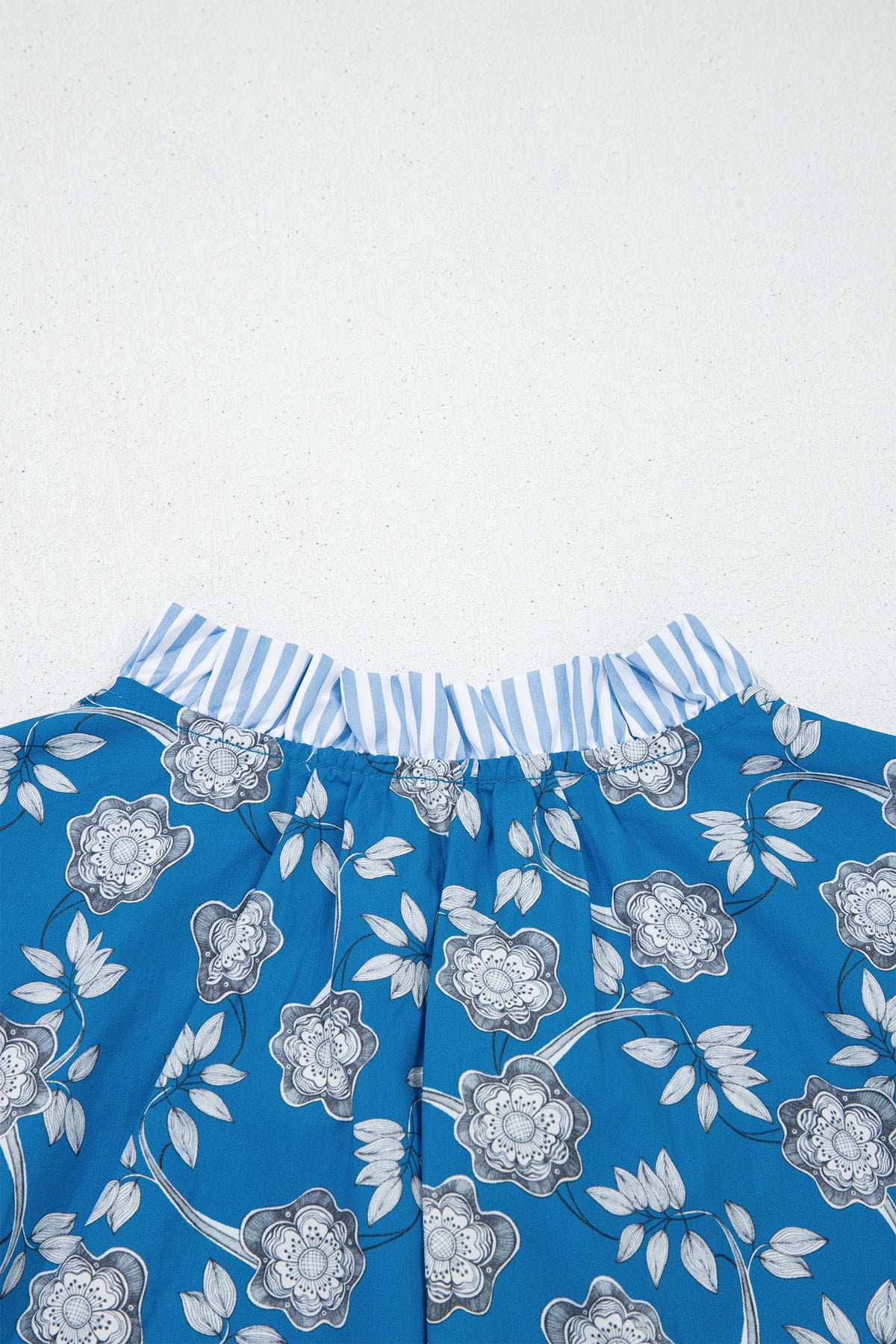 Blue Floral Top with Tie Neck & Puff Sleeves