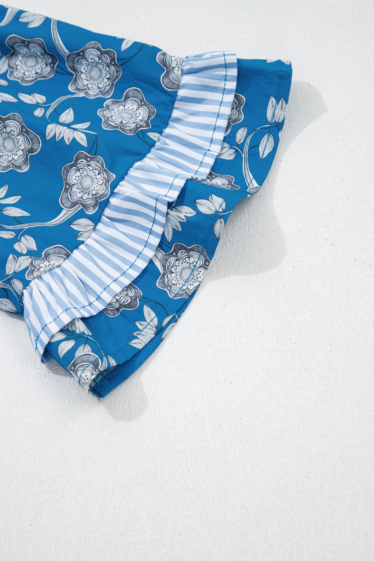Blue Floral Top with Tie Neck & Puff Sleeves