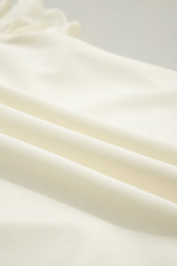 Soft Cream Partial-Zip Top with Ruffled Sleeves