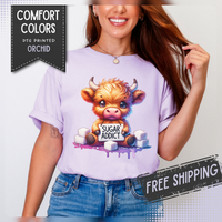 Sugar Addict Highland Cow - Comfort Colors | Trendy Women's T-Shirt. Direct to Garment. Printed & Shipped in the USA. Unisex Sizes.
