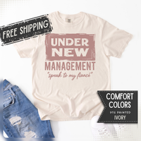 Under New Management "Speak to My Fiancé" - Comfort Colors | Trendy Men's and Women's T-Shirt. Direct to Garment. Printed & Shipped in the USA. Unisex Sizes.