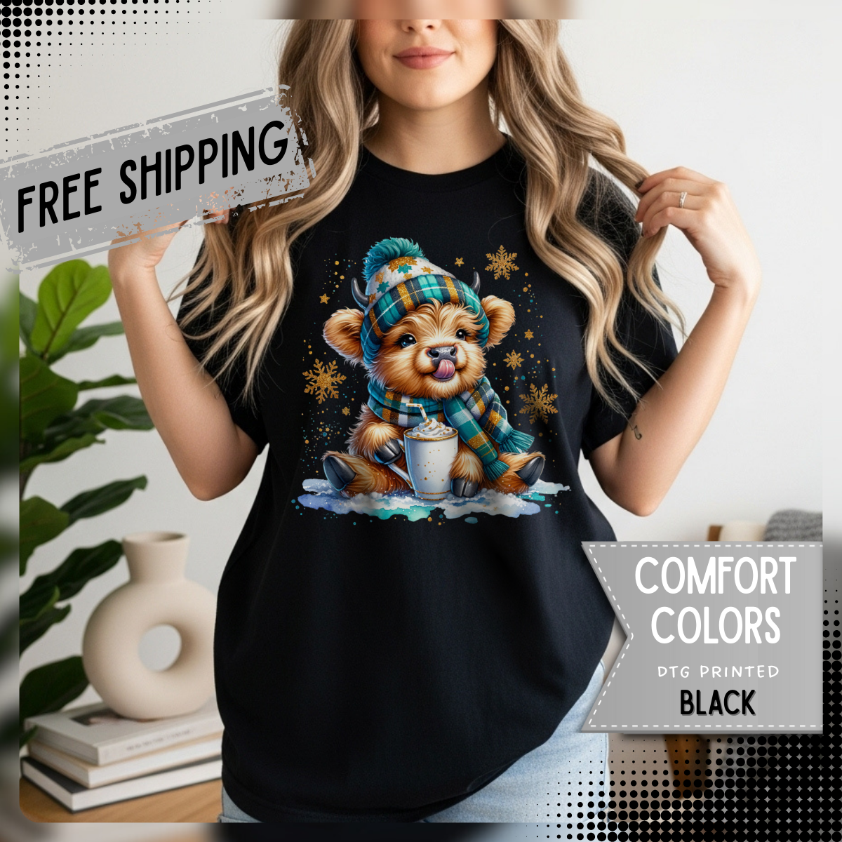 Winter Baby Highland Cow with Cocoa  - Comfort Colors | Trendy Women's T-Shirt. Direct to Garment. Printed & Shipped in the USA. Unisex Sizes.
