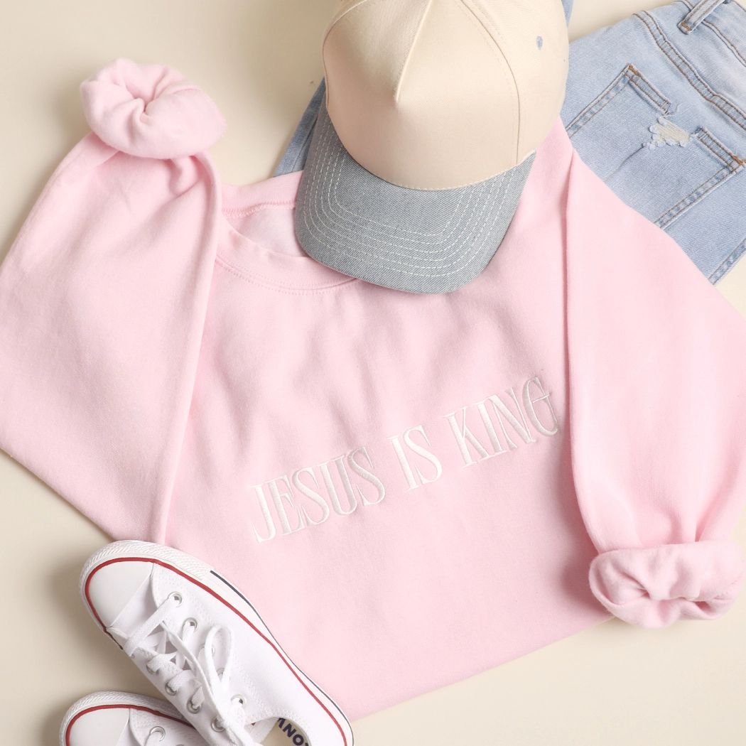 Jesus Is King, Light Pink Heavyblend Sweatshirt - Embroidered